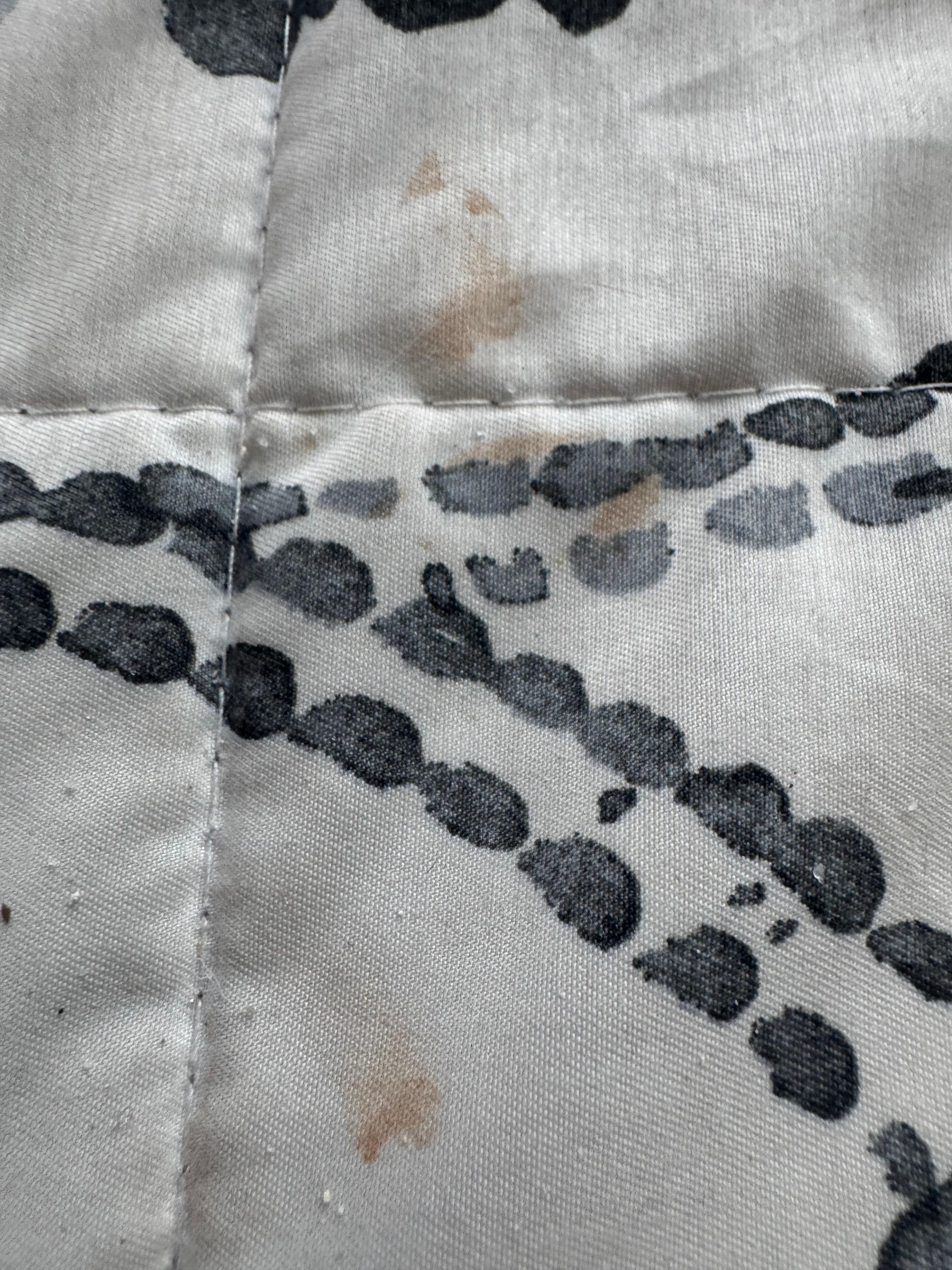 Something gross on the bed cover!