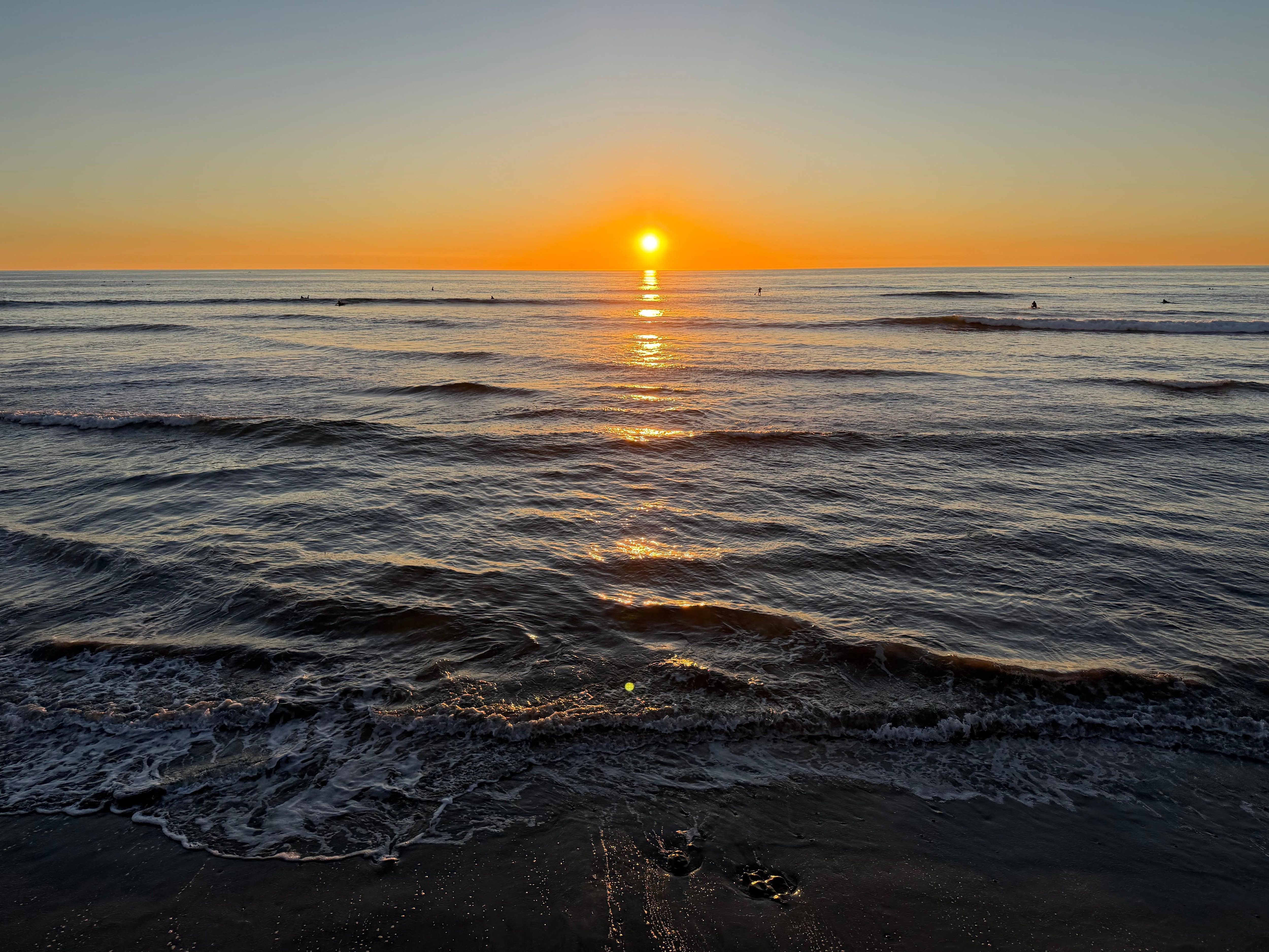 Walk down the steps at sunset and be on the beach