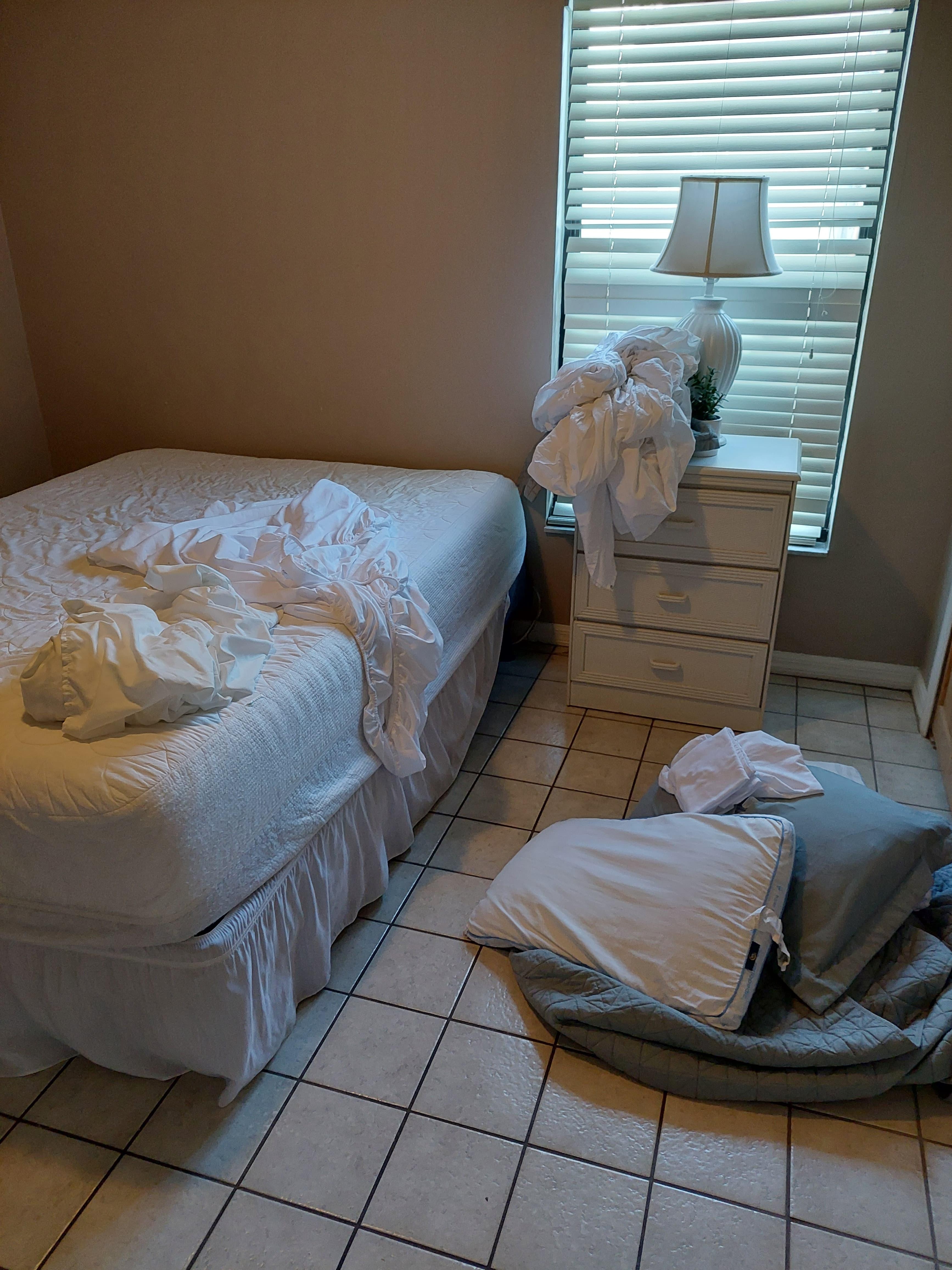 The state of one bedroom on arrival
