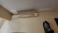 Heater on the ceiling but fire damage in the past.
