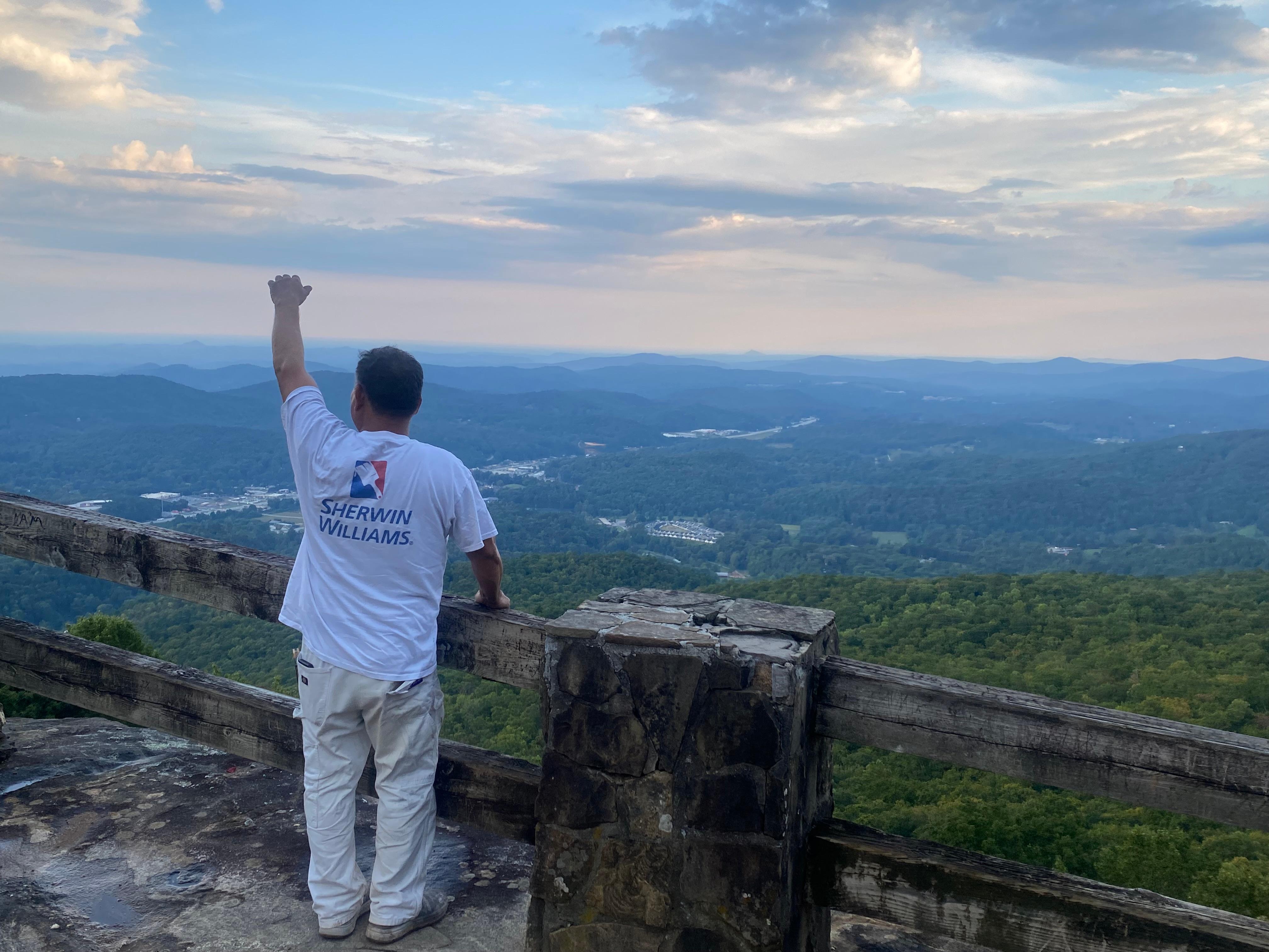 The house is located down there in the populated area.