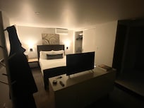 Bed, tv to left of entry door.
(Note: windows not operable)