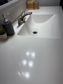 Sink area in bathroom.