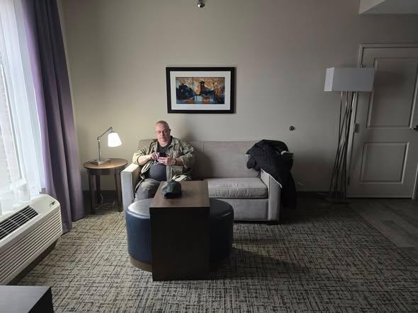Our suite - me on the couch, 3-11-26