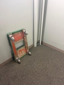 Maintenance supplies left in hallway