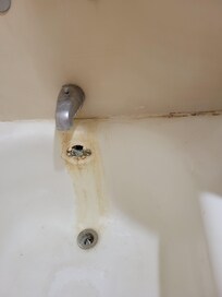 Brown stains in bathtub