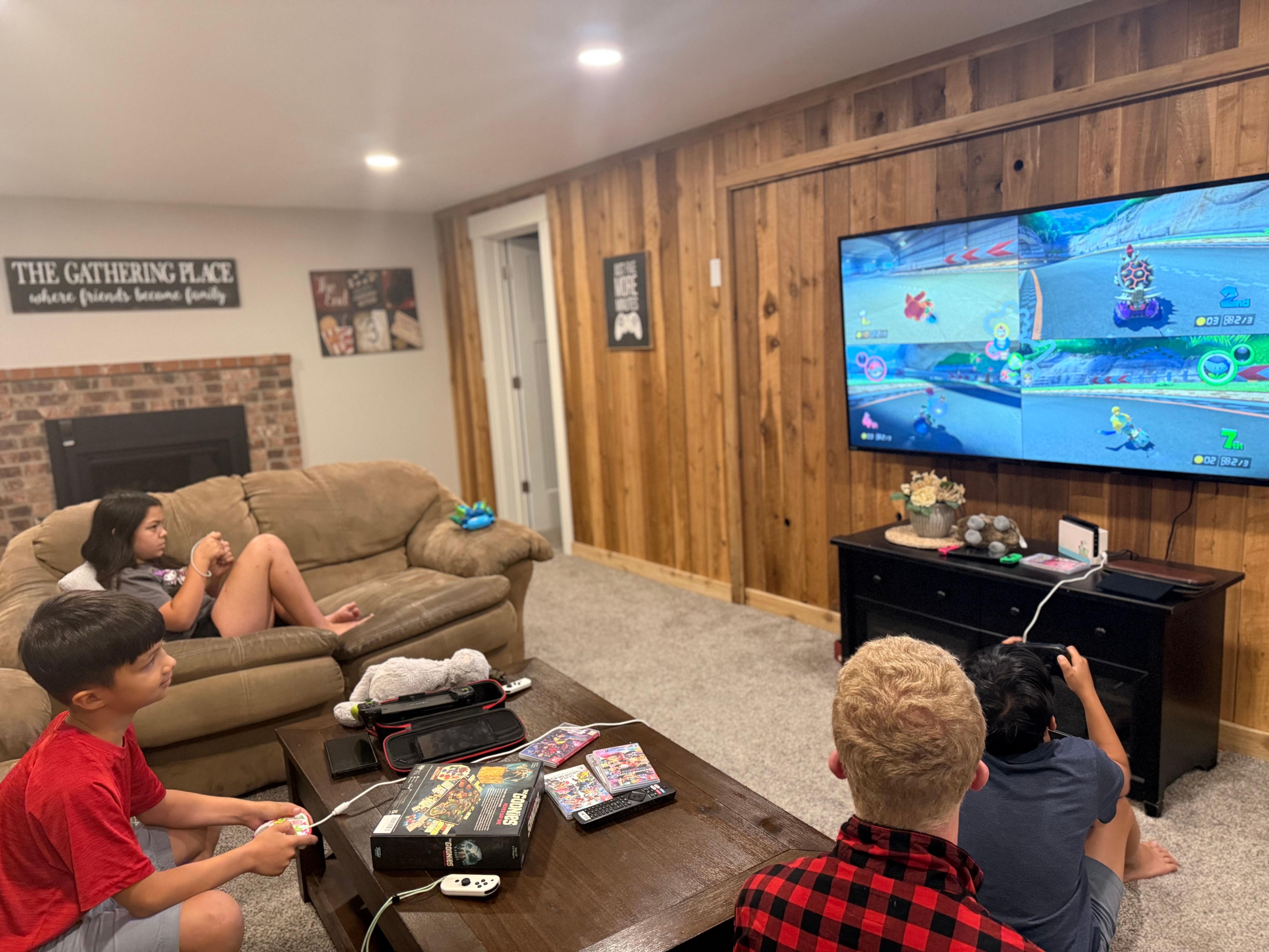 Kids enjoying the game room downstairs. 