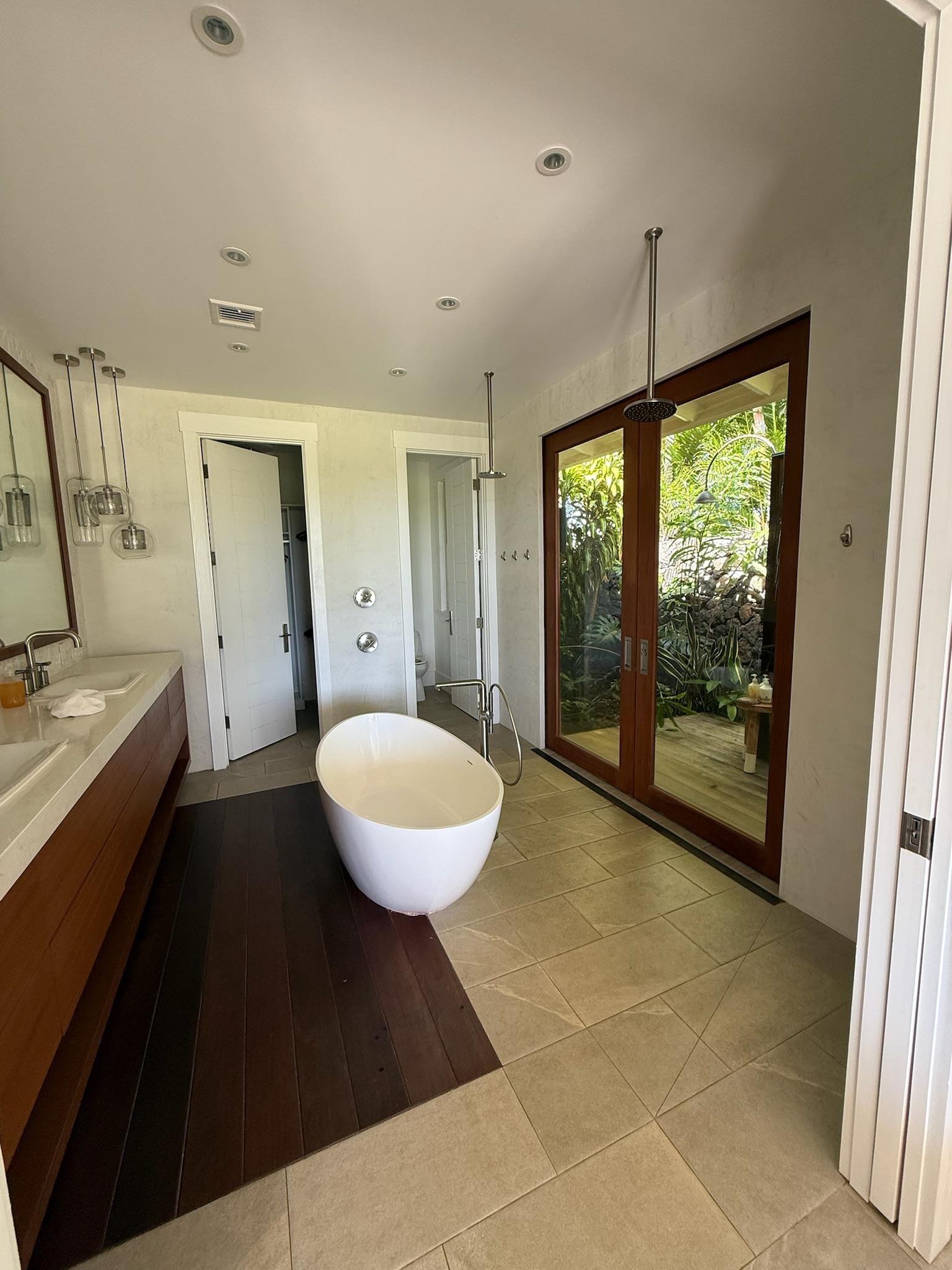 Master bathroom leading to outdoor shower