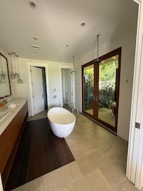 Master bathroom leading to outdoor shower