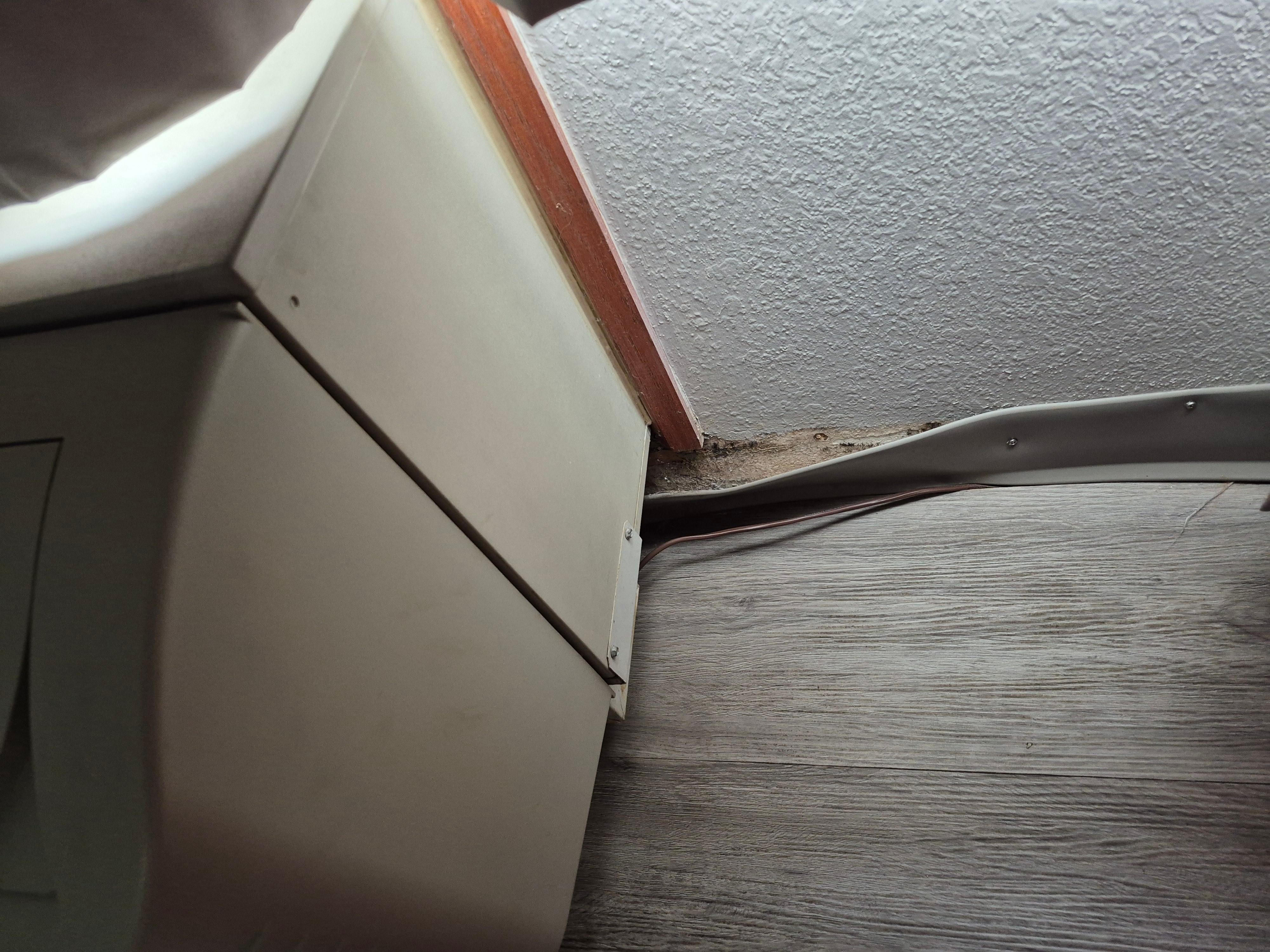 Wall molding next to a/c unit coming loose and attempted repairing 