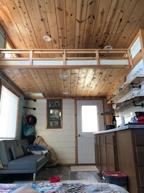 Cute! View from bed. Can climb the ladder. Tons of dead flies up there! Camper mattress in loft but no space to lay on mattress, unless you’re thin as paper