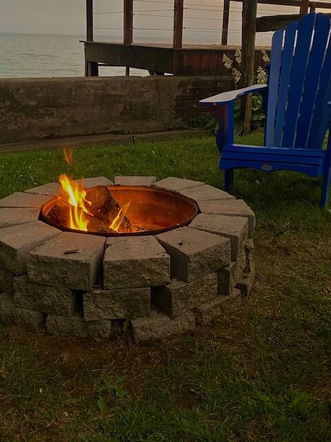 Adirondack chairs and a great fire pit.