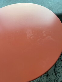 Table in the room, unclean.