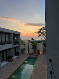 Pool and view of the ocean n far distance.
