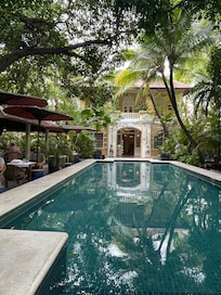 Tranquility and lush calm by the front pool