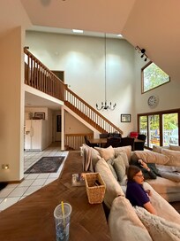 Looking into the living room from the screened in porch