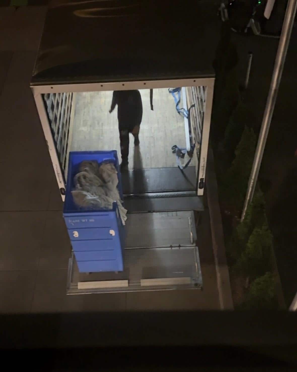 Loading laundry carts outside my window at 3am