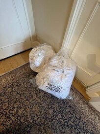 Dirty laundry in entrance