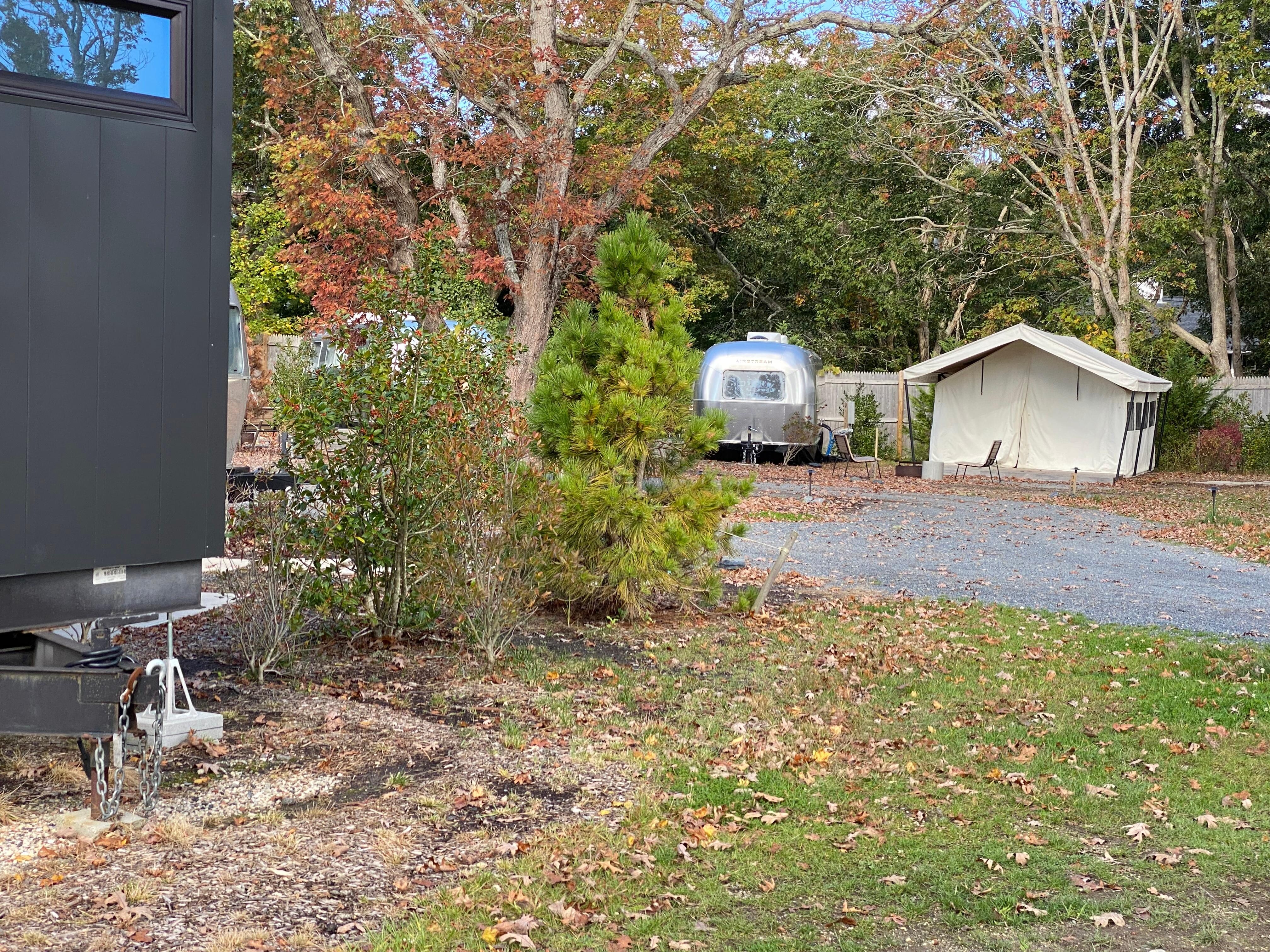 Ada suite on the left, airstream, and luxury tent