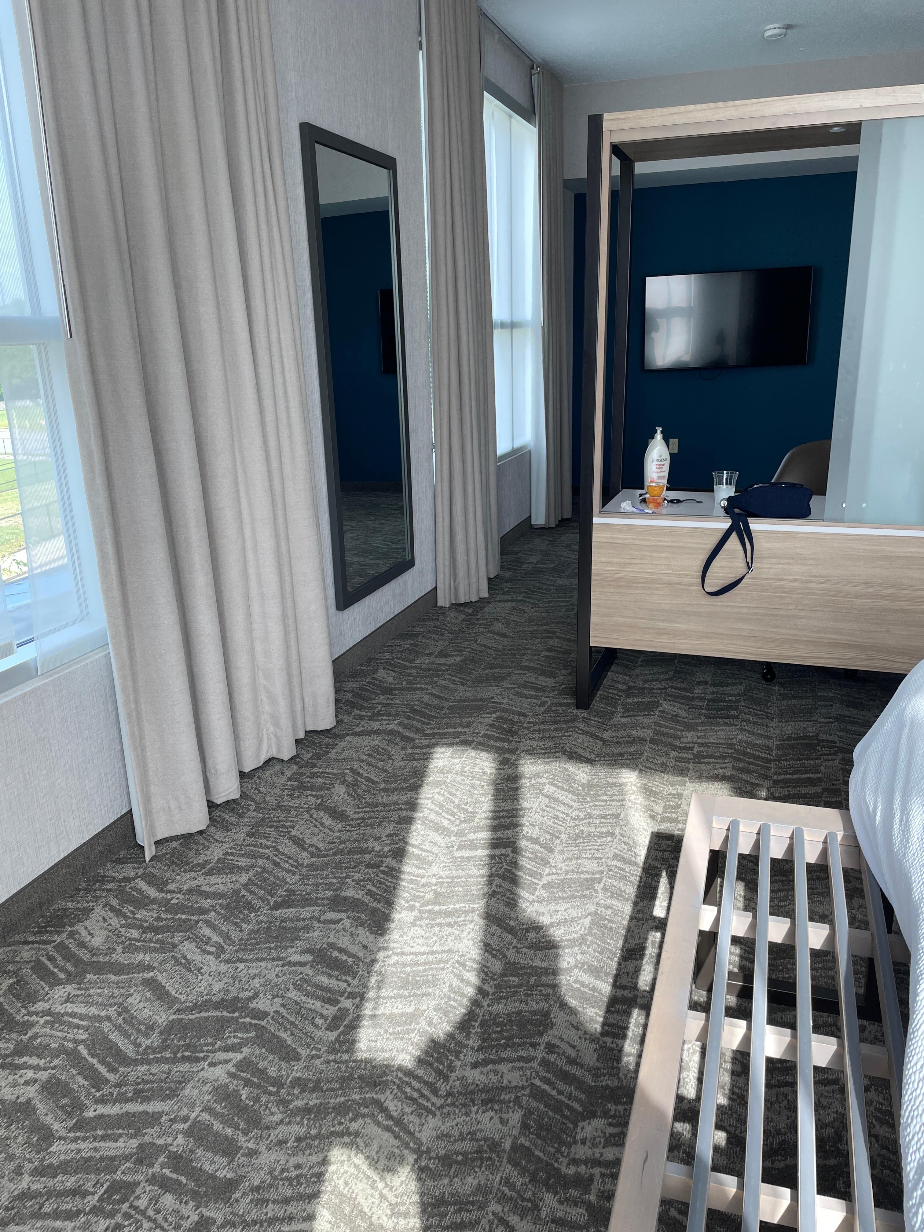 Far left of bedroom  (well lit) 