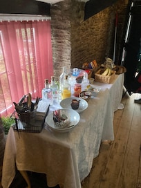 The table outside the doors to the bedrooms with breakfast options. Quality was good but limited to one croissant, one muffin each and cereal