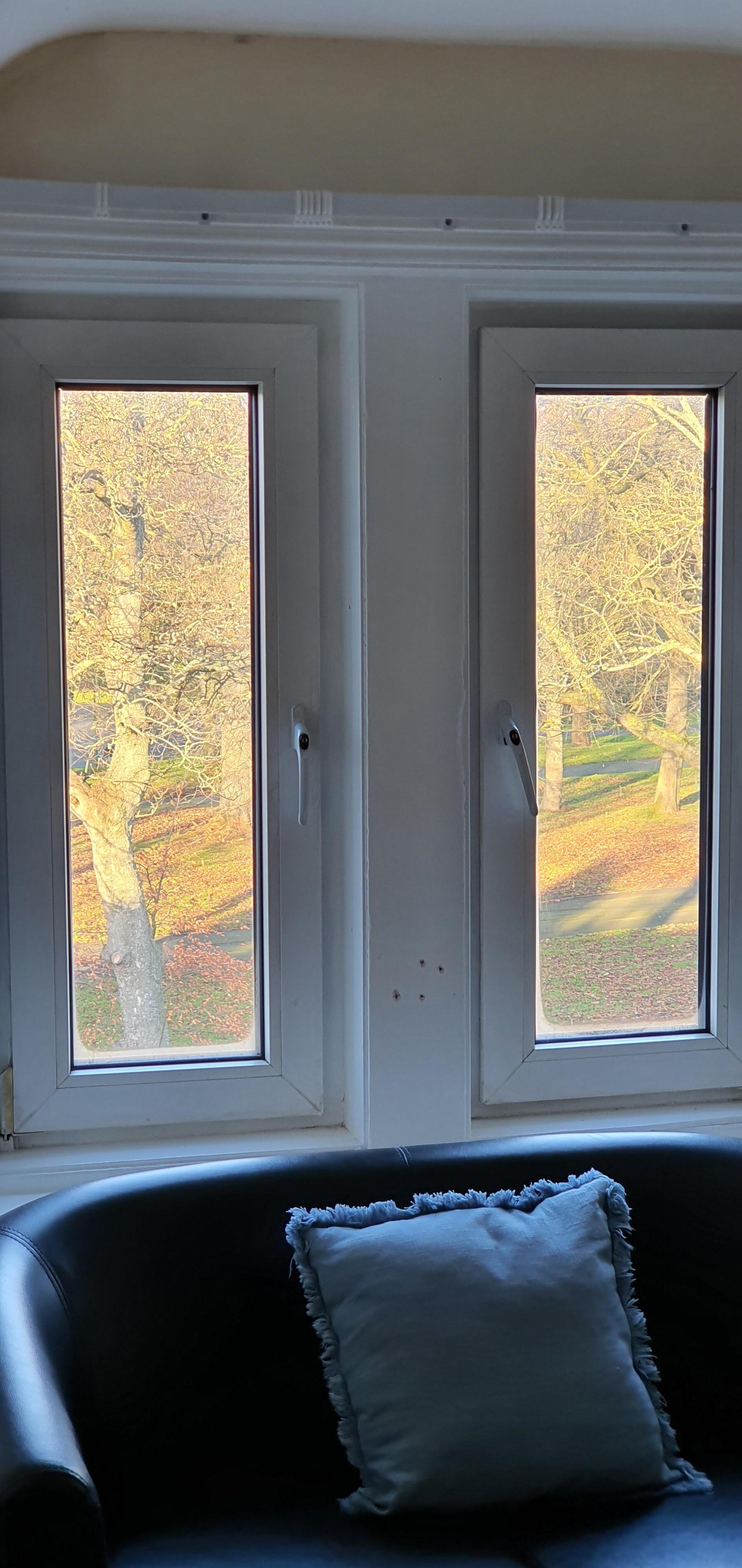 Curtain rail but no curtains! 