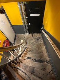 Hallway with work out grubby carpets that stick to your feet