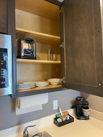 Look inside one of the kitchen cabinets