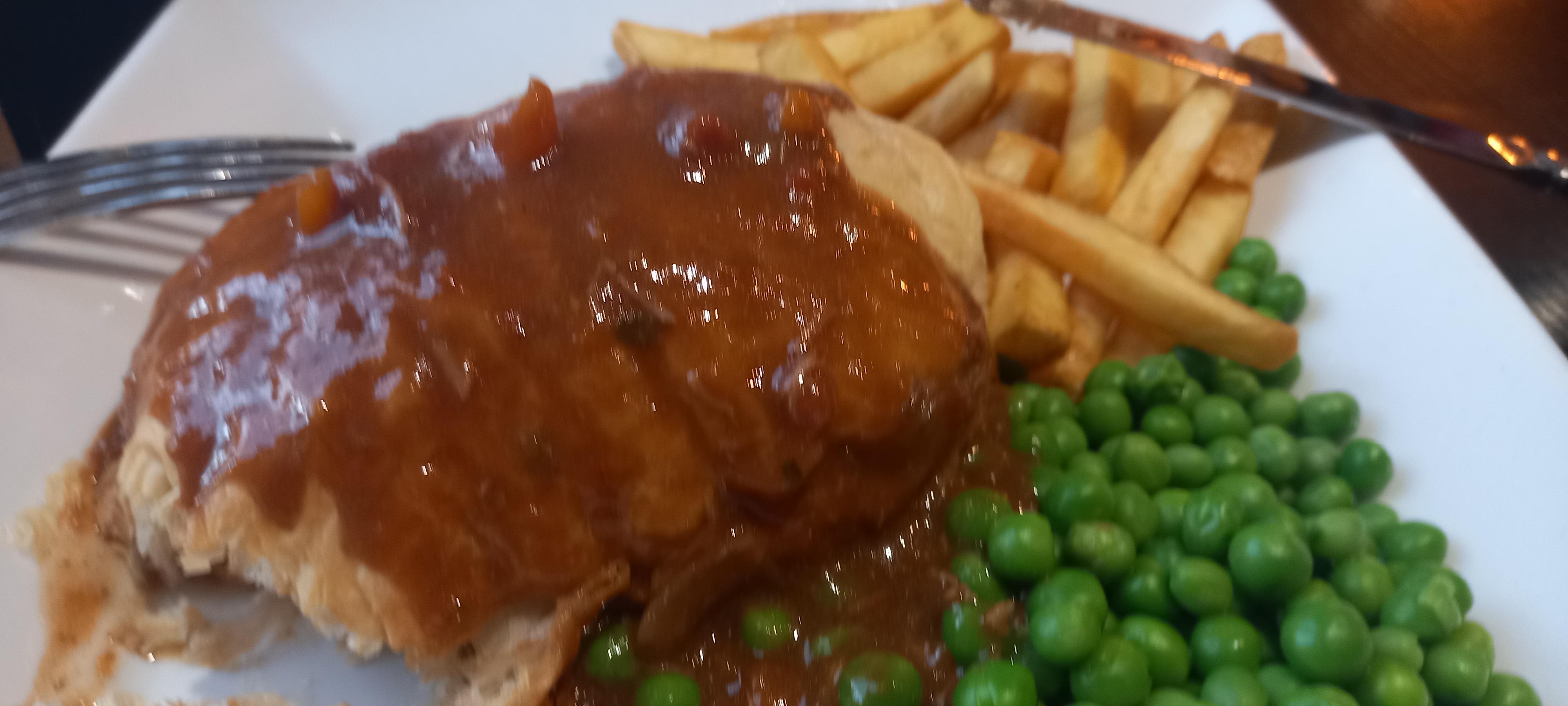 Evening meal. Steak pie, chips and peas. Very tasty