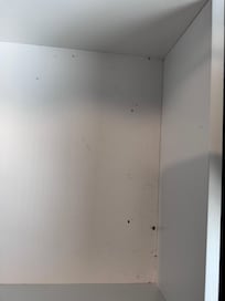 Bugs, hair, and what appears to be bug droppings in the drawers