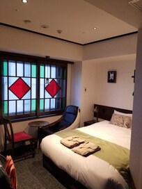 Spacious room with a message chair