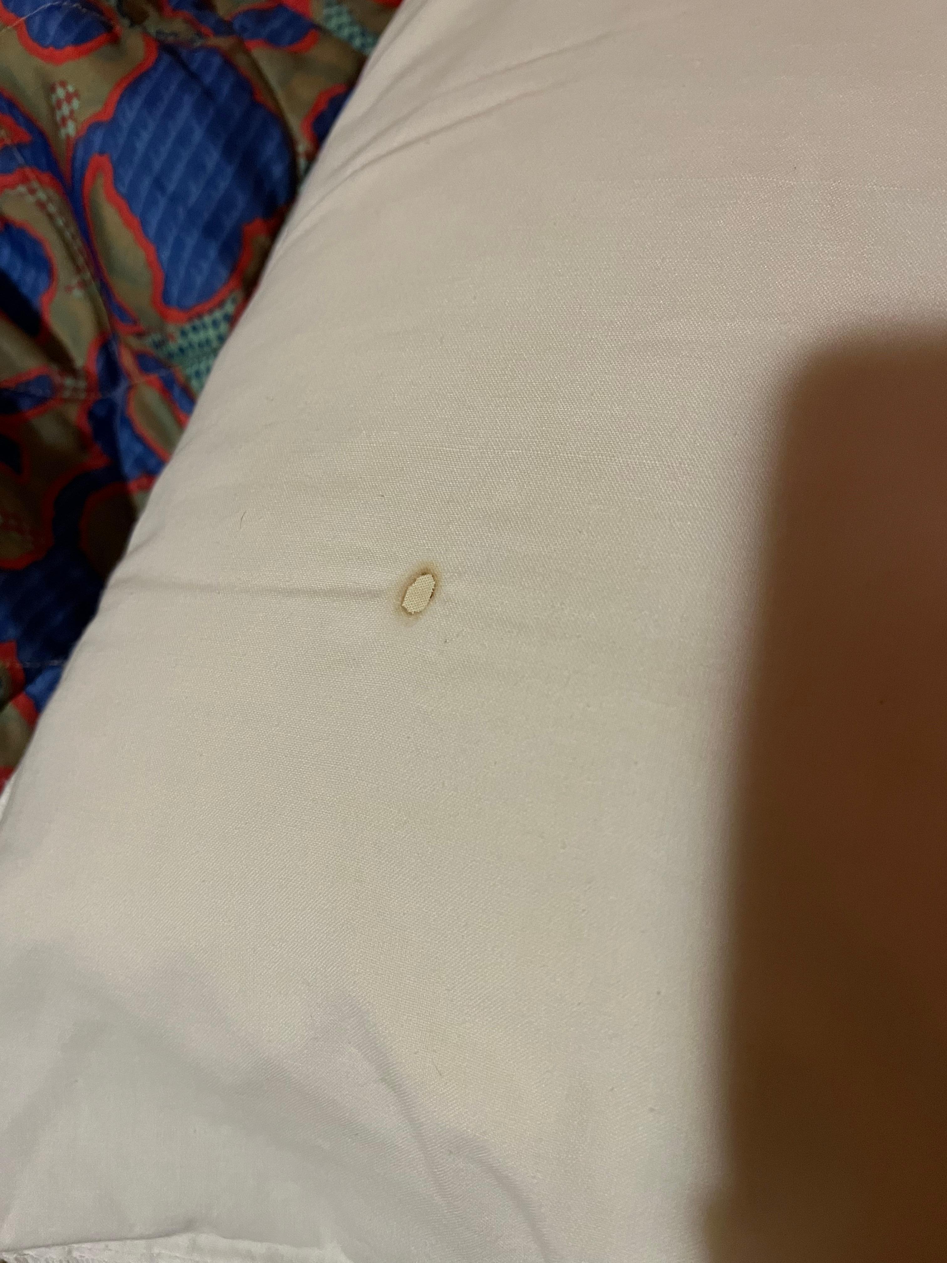 Cigarette burn in pillow