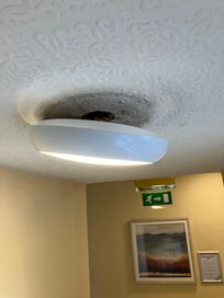 Light in corridor outside room 9 falling down