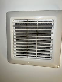 Bathroom ventilation completely clogged up with dust