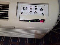 Broken air conditioner control panel.