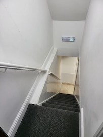 Small stairs to walk down to the basement.