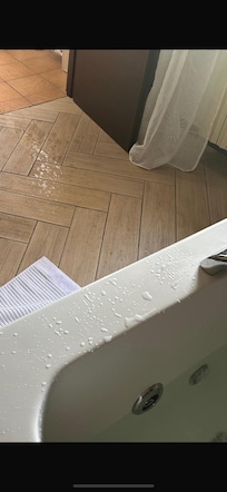 Water spray from the jetted tub.