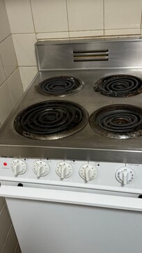 Stove was warning line on it and nasty looking burners