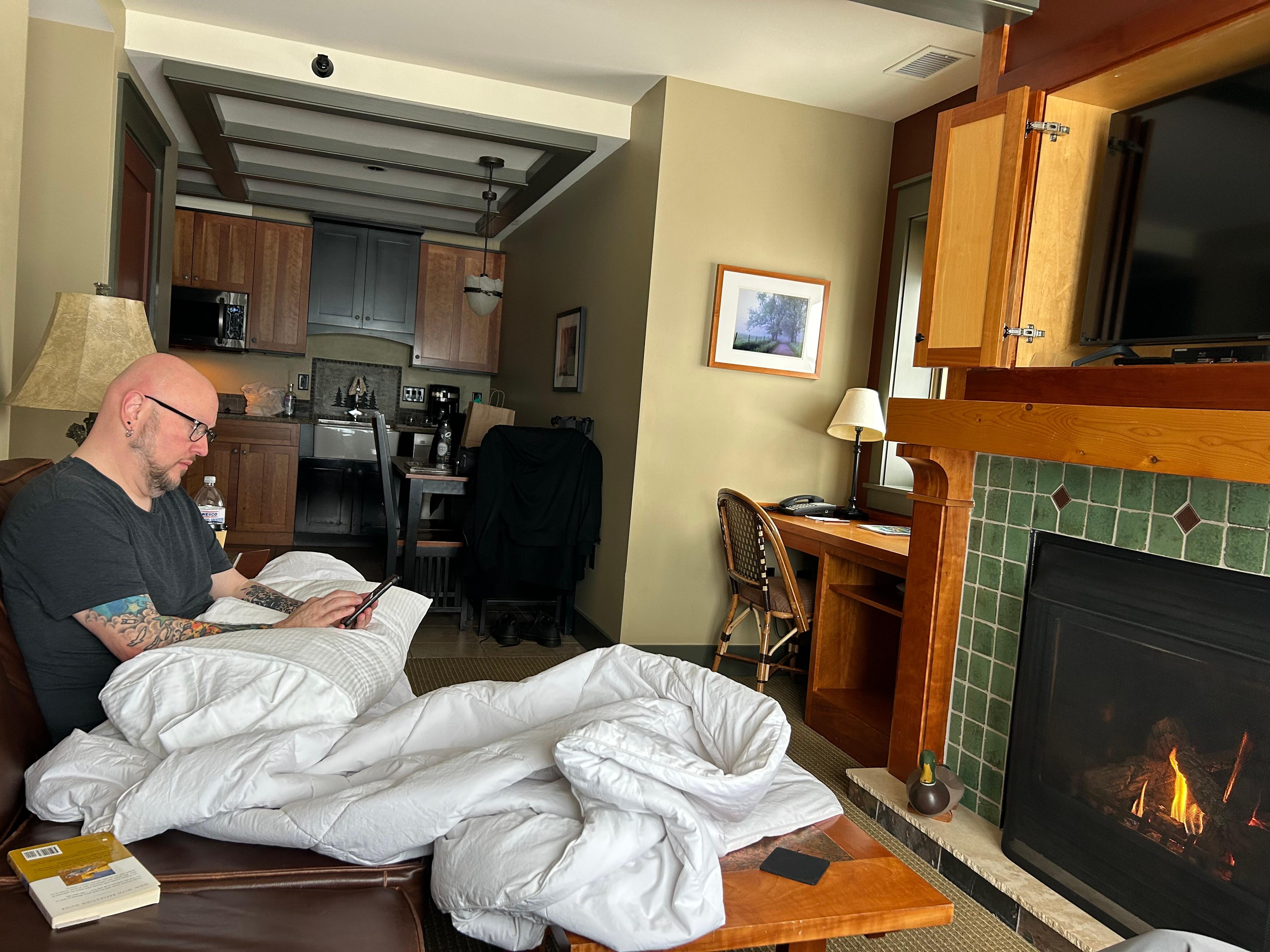 My husband enjoying a quiet morning at The Tamarak