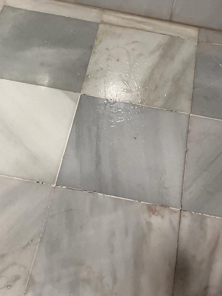 Wet floor of bathroom 