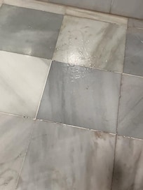 Wet floor of bathroom