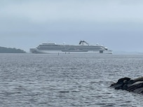 Viking Cruise ship anchoring in bay for day trip