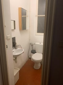 Toilet in hall whole description says it’s a studio