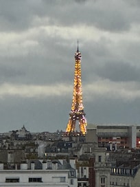 Eiffel Tower view from apartment balcony zoomed in