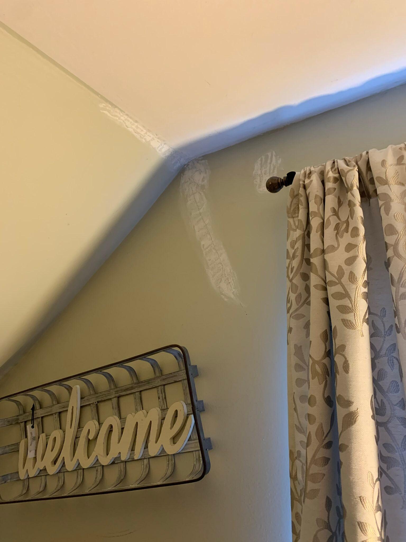 unpainted cracks in wall