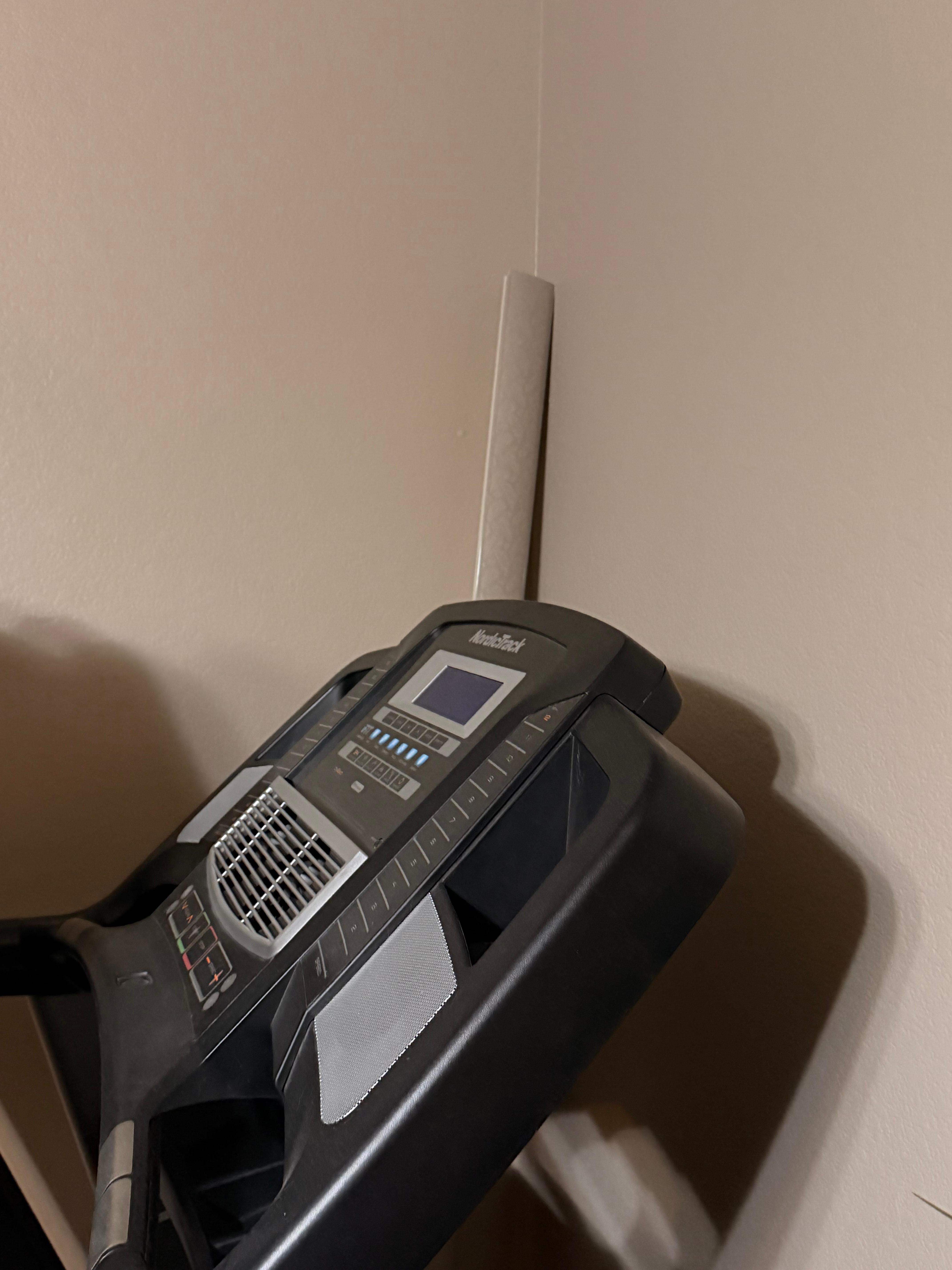 Broken blinds in the corner of master