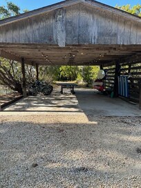 listing shows a nice seating area.. no chairs and flat tire bikes