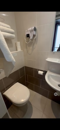 Bathroom is clean. As well as all other spots in the room. It’s all laminated no carpet at all which is my favourite one.