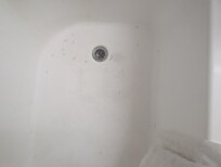Chipping in tub.