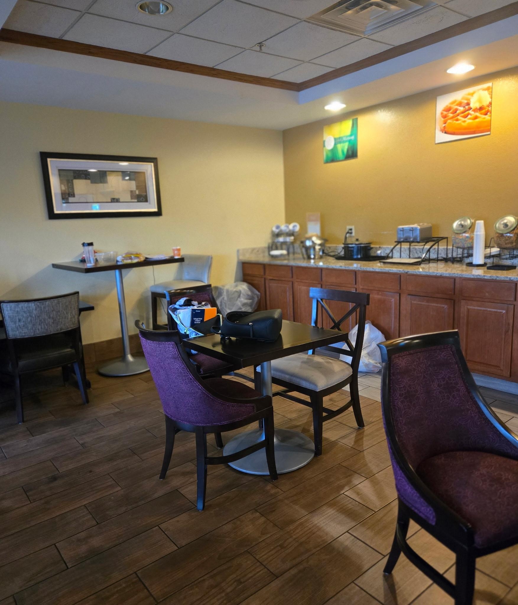 The worker had 2 tables full of her personal stuff and kept bringing more stuff throughout the day.  She took the half full garbage out of the can after breakfast but left it in front of the breakfast bar until after 8 p.m. 